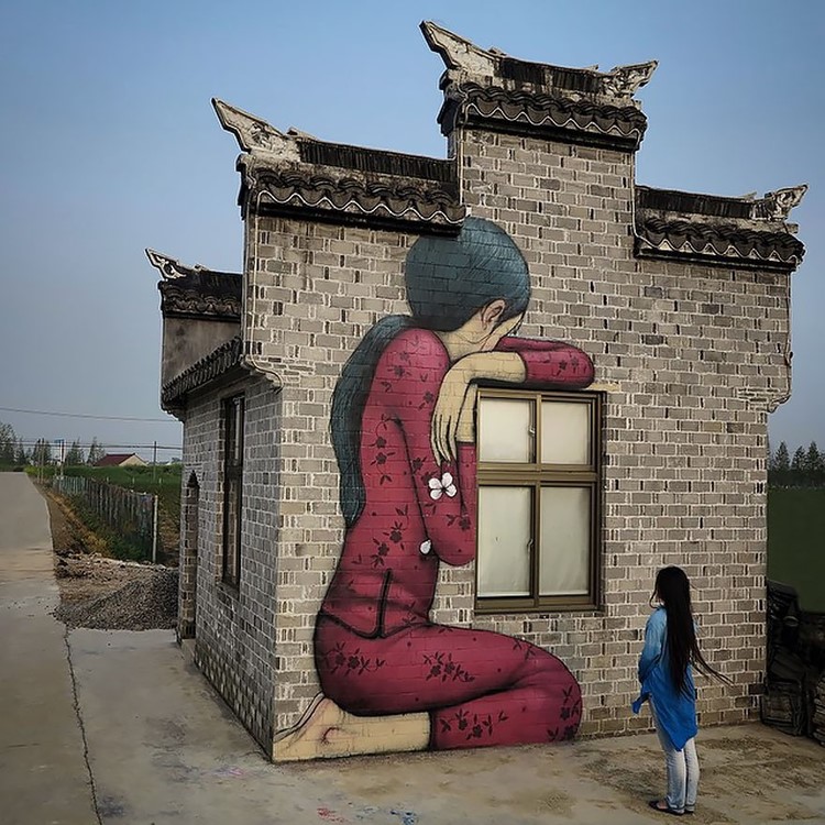 Street-Artist-Transformed-Buildings-into-Works-of-Art