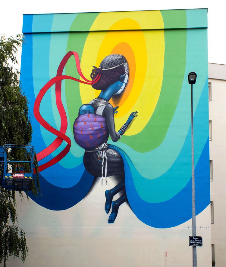 Street-Artist-Transformed-Buildings-into-Works-of-Art