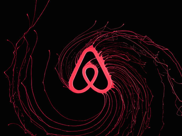 Liquid-Brand-Logos-Dipped-In-Paint