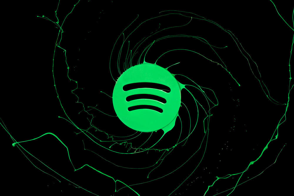 Liquid-Brand-Logos-Dipped-In-Paint