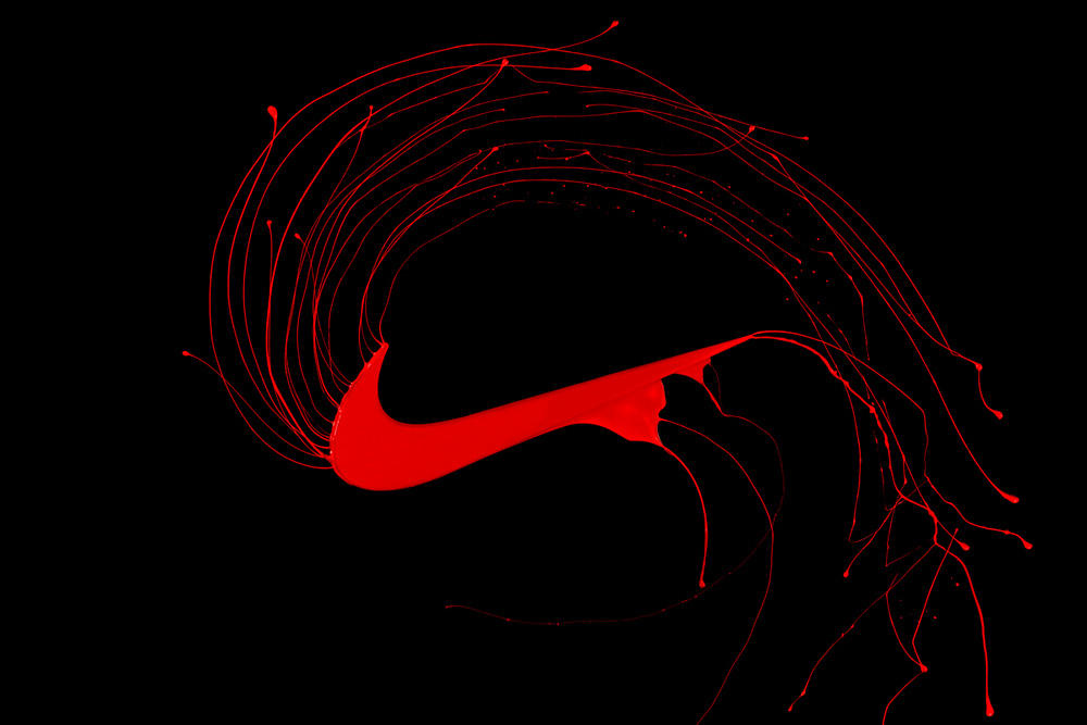 Liquid-Brand-Logos-Dipped-In-Paint