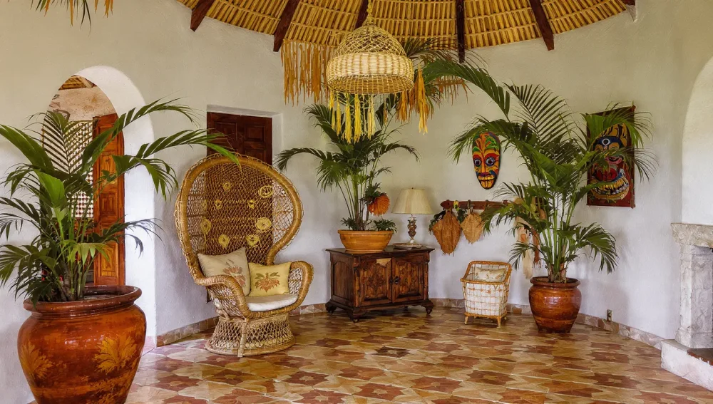 Puerto Rican interior design featuring losa criolla tiles and vejigante masks.