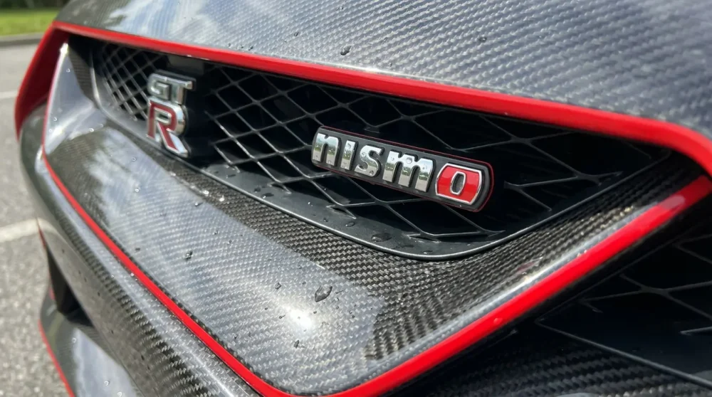 Nismo performance badge on a Nissan sports car
