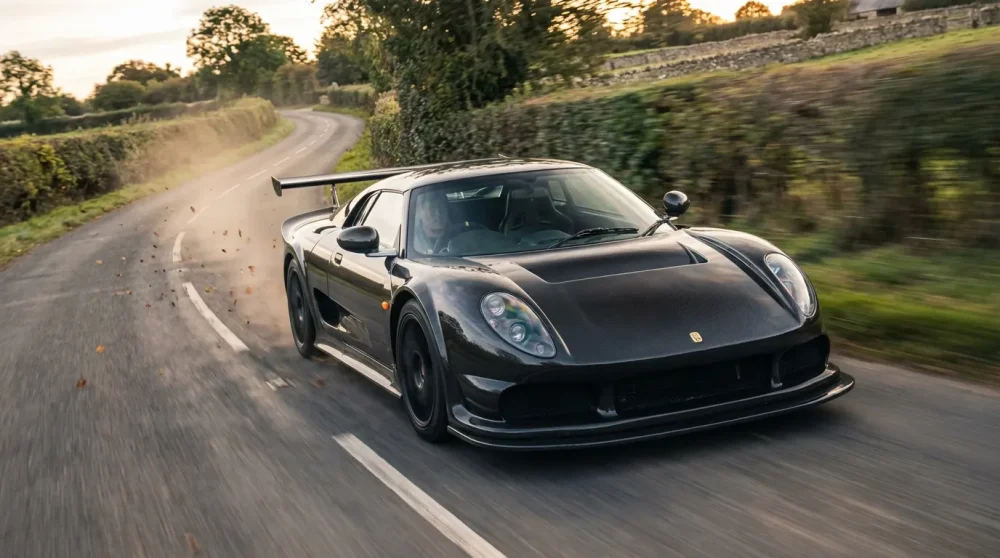 Noble M600 supercar driving on a road
